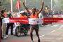 Ethiopian athlete Deriba Merga  reaches the finishing line. Mergia won the Airtel Delhi  Half Marathon for men,in New Delhi on Sunday.