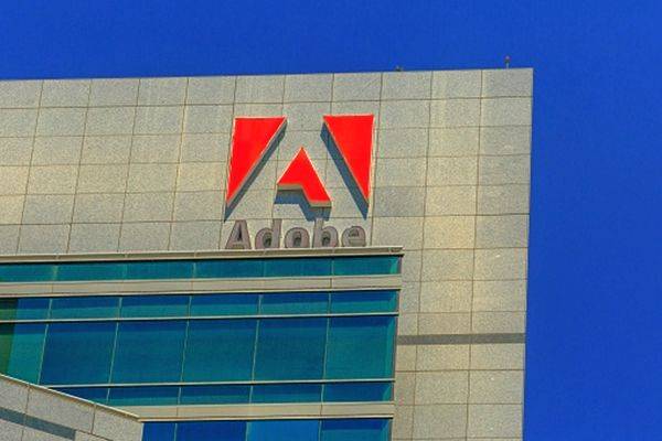 Adobe lays off 100 employees, says 'not doing company-wide layoffs' - Vimarsana News