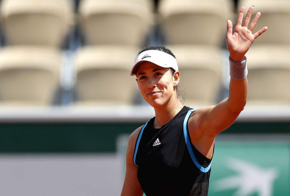 Australian Open: Muguruza, Swiatek advance with first-round wins