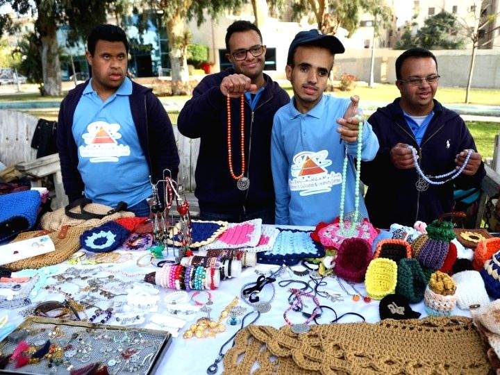 Egyptian children with Down syndrome exhibit hand-made creations - Vimarsana News