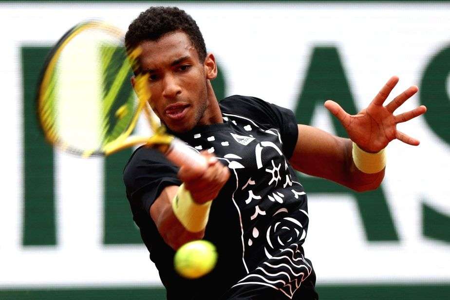 French Open: Auger Aliassime survives Varillas scare, moves to second round - Vimarsana News