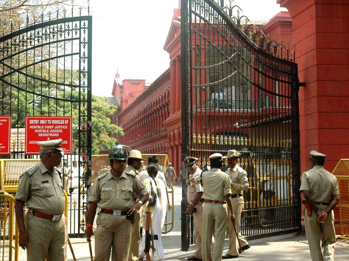 Open schools, no religious symbols allowed for now, says K'taka HC - Vimarsana News