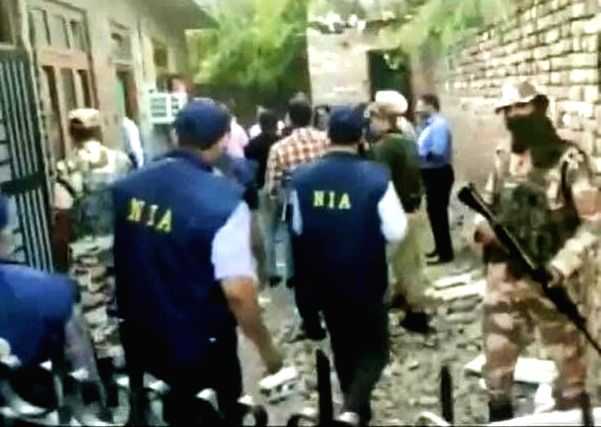 NIA raids multiple locations in J&K, seizes digital devices - Vimarsana News
