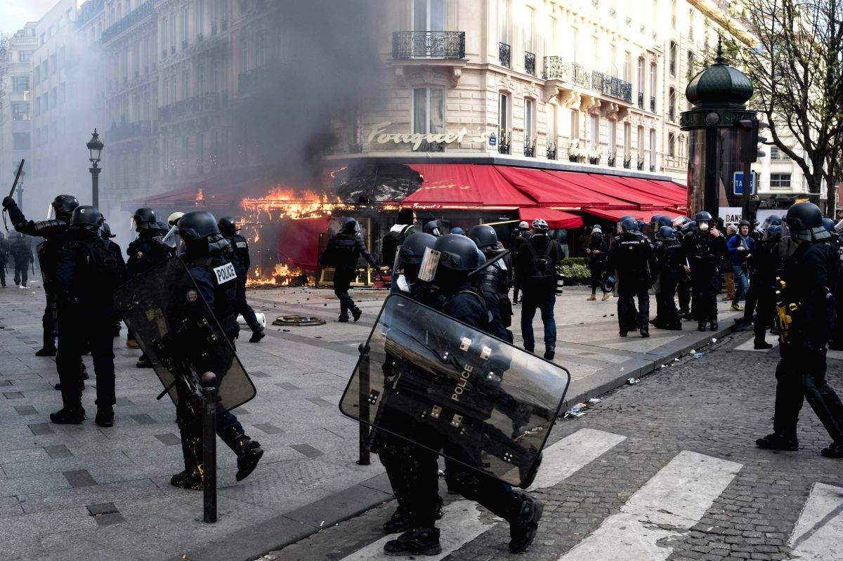 Protesters clash with riot officers at march for killed teen in France - Vimarsana News