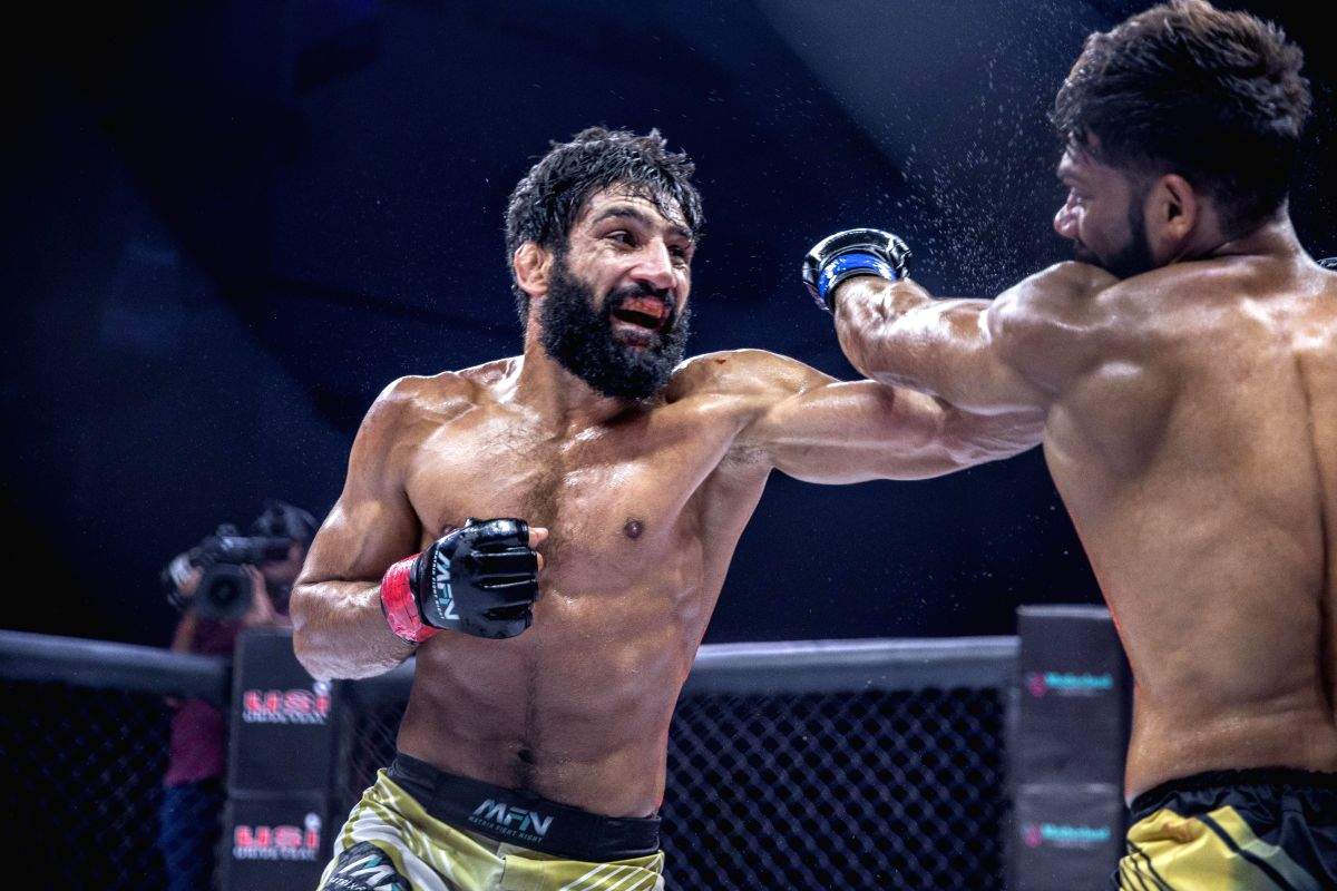 Sanjeet Budhwar retains Featherweight title in MFN 13 - Vimarsana News