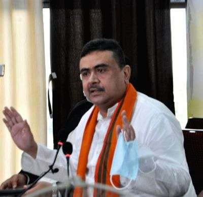 Suvendu Adhikari posts video of cop holding umbrella for Trinamool leader - Vimarsana News