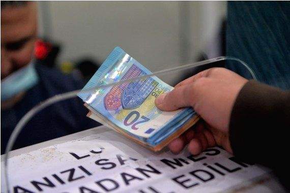 Turkey cuts benchmark interest rate again, lira dips to historic low - Vimarsana News