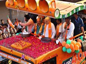 HM Amit Shah holds massive roadshow in Karnataka's Haveri - Vimarsana News
