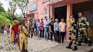 Kathua DC-cum-returning officer waits in queue to cast vote in J&K's Kathua-Udhampur constituency - Vimarsana News