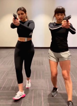 'Action heroine' Parineeti shares glimpse of gun training - Vimarsana News