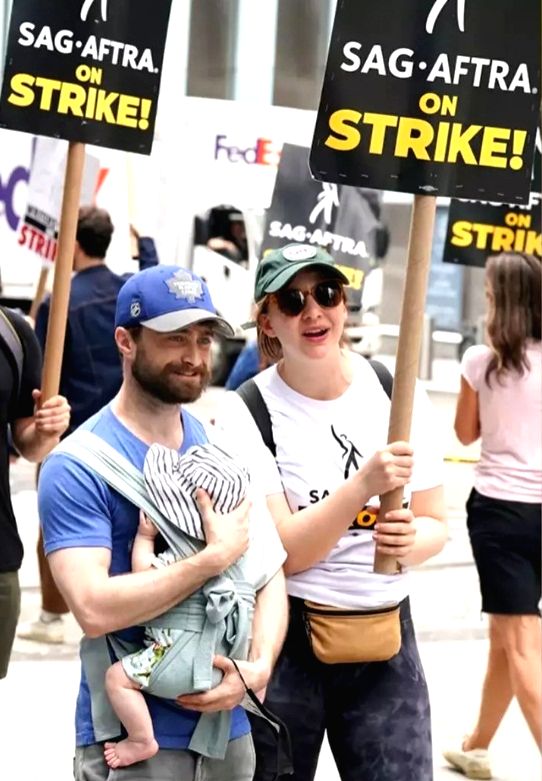 Dan Radcliffe, Erin Darke join Hollywood strikers; give first glimpse of son at picket line - Vimarsana News