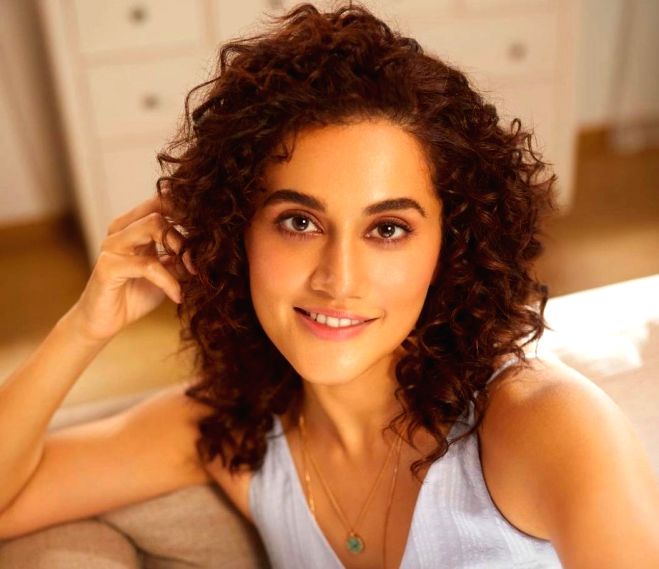 Taapsee Pannu looks sizzling hot in a blue bodycon dress - Vimarsana News